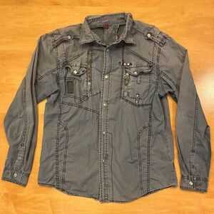 Men's faded-navy casual jacket with lots of zippers, pockets and snaps